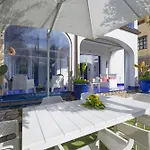 De Vivo Realty - Blue Skyline * ماسّا لوبْرينسِ